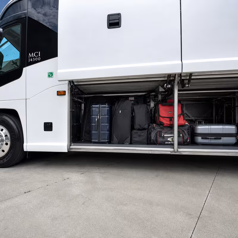 Party bus interior with wraparound leather seating and LED lighting in Colorado Springs