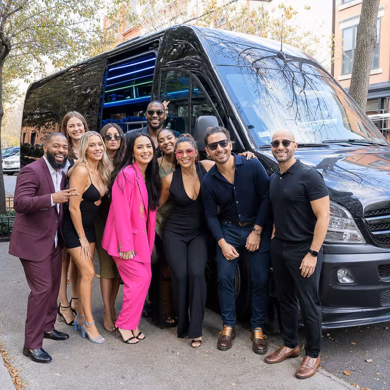 Party bus interior with wraparound leather seating and LED lighting in Colorado Springs