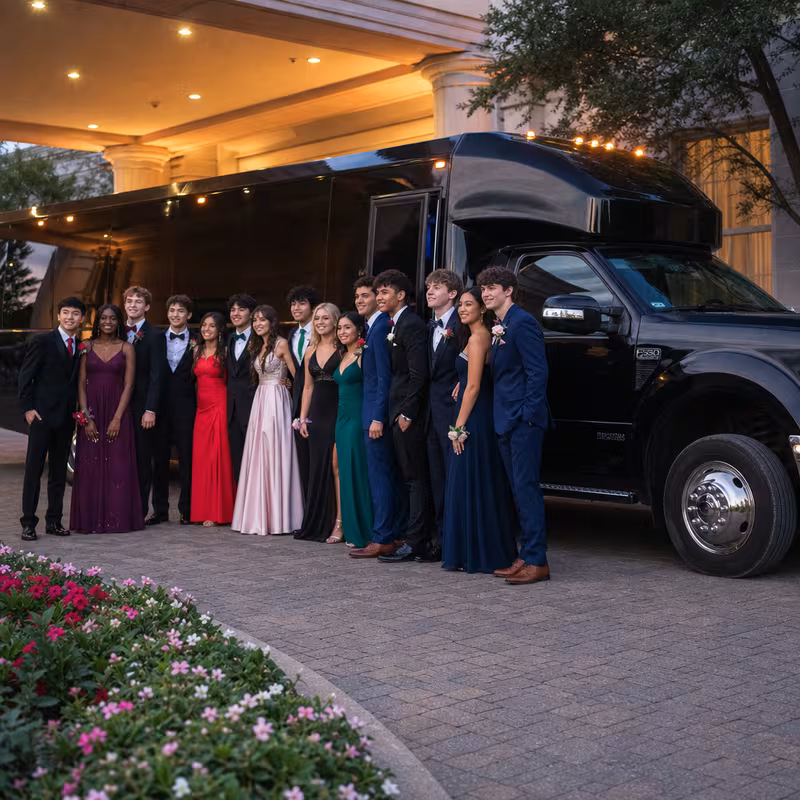 Party bus interior with wraparound leather seating and LED lighting in Colorado Springs