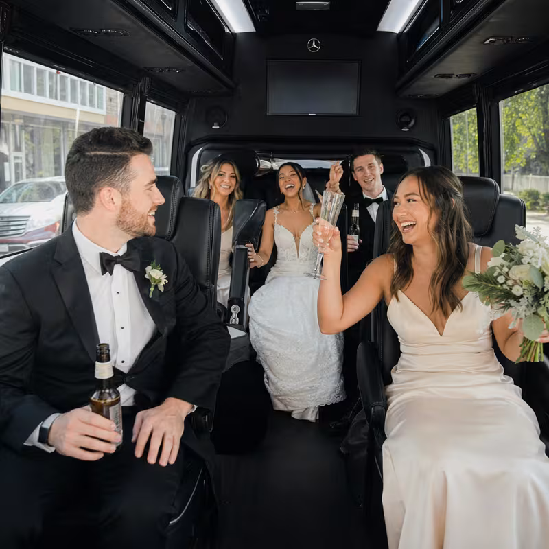 Black Mercedes Sprinter van staged for an Colorado Springs Wedding Transportation group